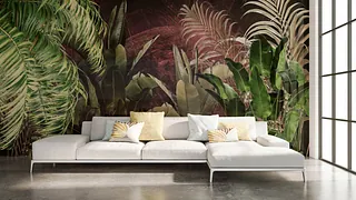 Hvit sofa foran plantevegg